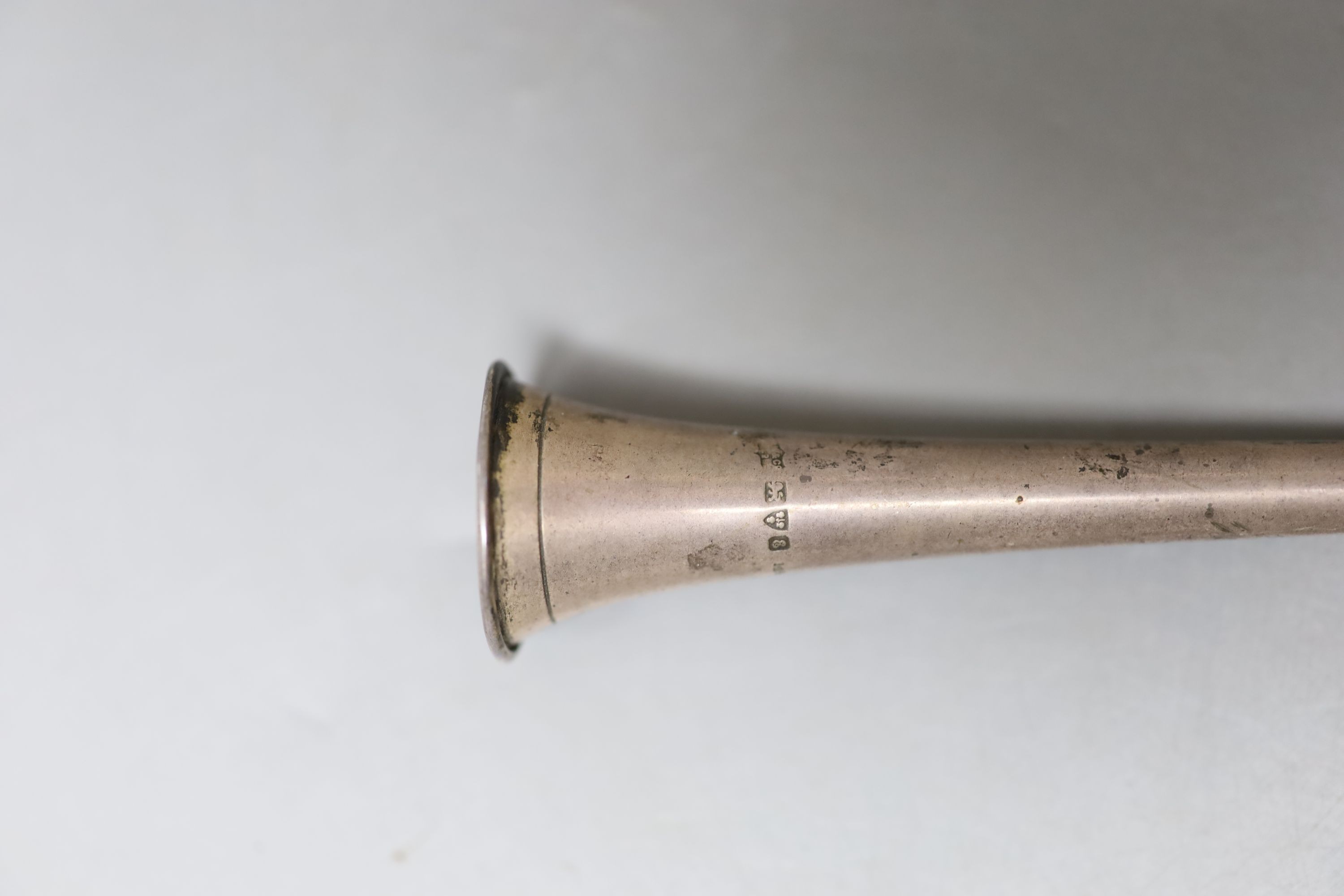 An Edwardian silver hunting horn, Sampson Mordan & Co Ltd, Chester, 1905, 30.1cm, together with a white metal and hardstone inset handled magnifying glass and a mounted horn whip.